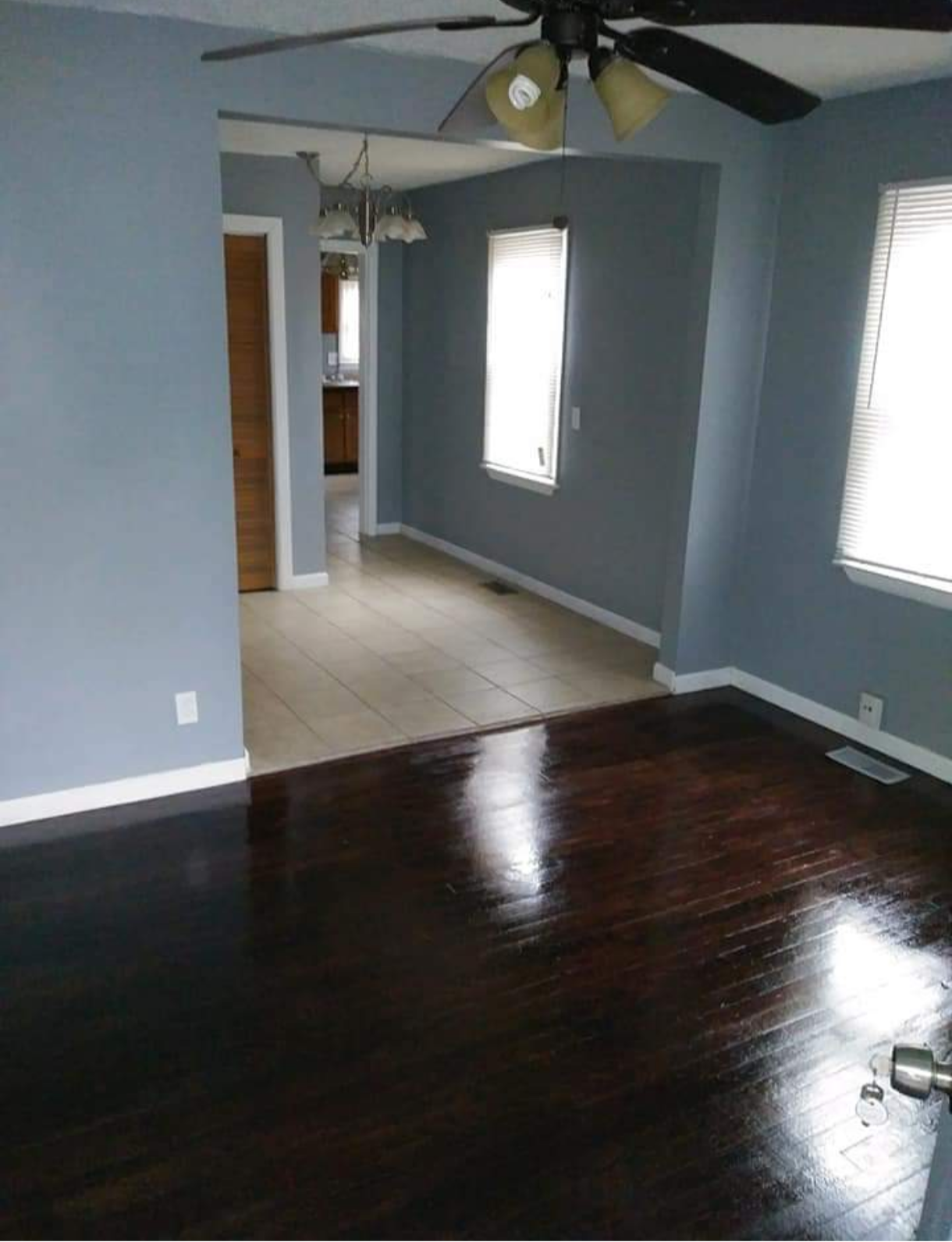 Hardwood floor and freshly painted wall completed