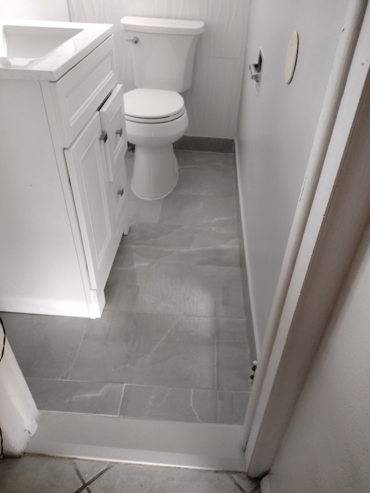 Full view of completed half-bathroom space