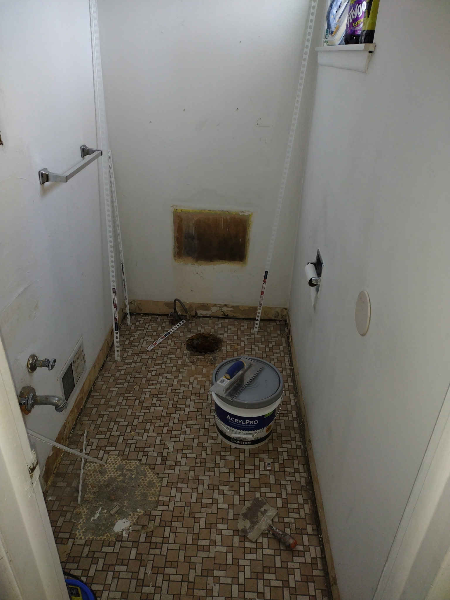 Half-bath flooring before work
