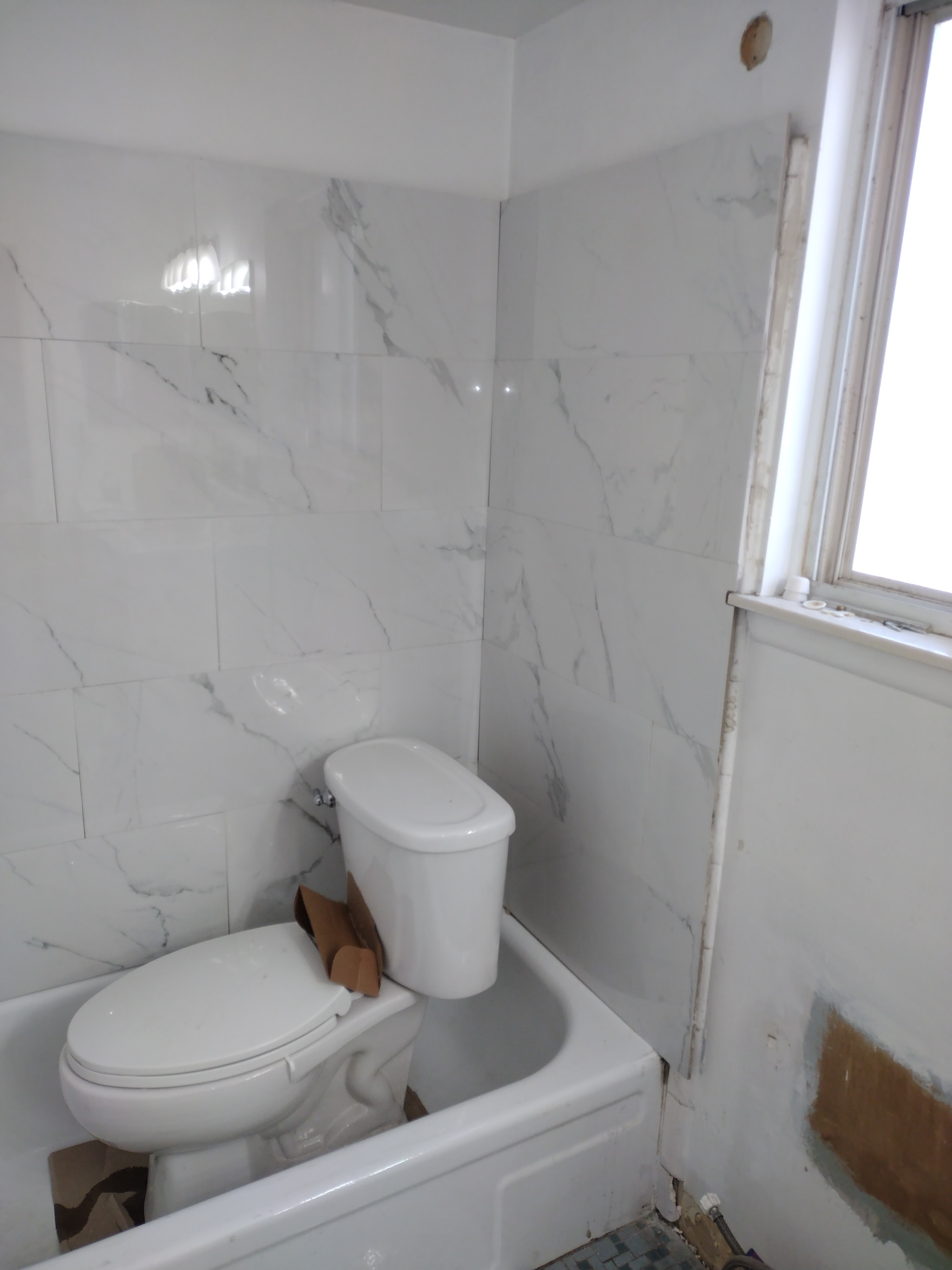 Bathroom vanity and tile work in progress