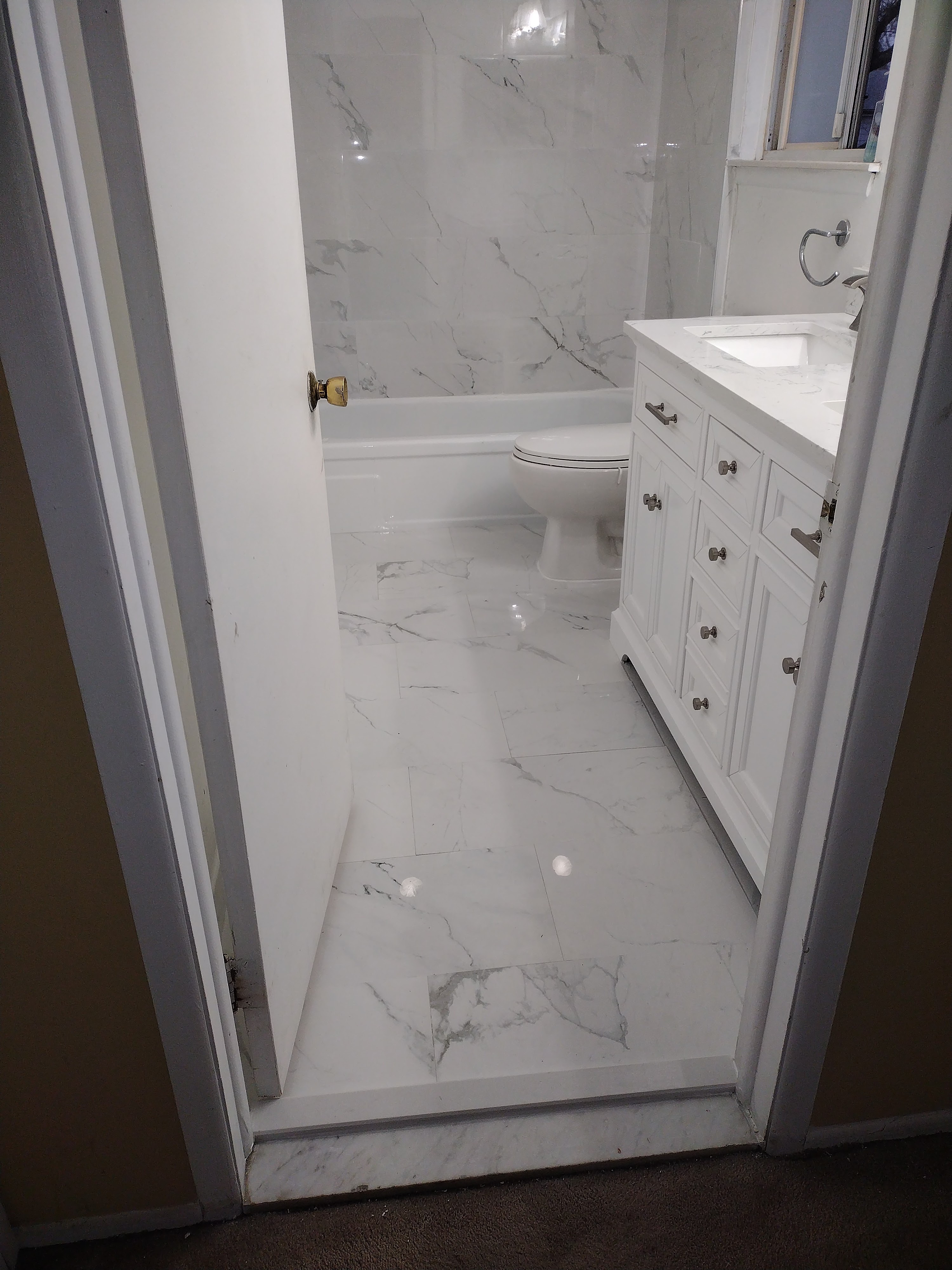 Full marble tile bathroom renovation