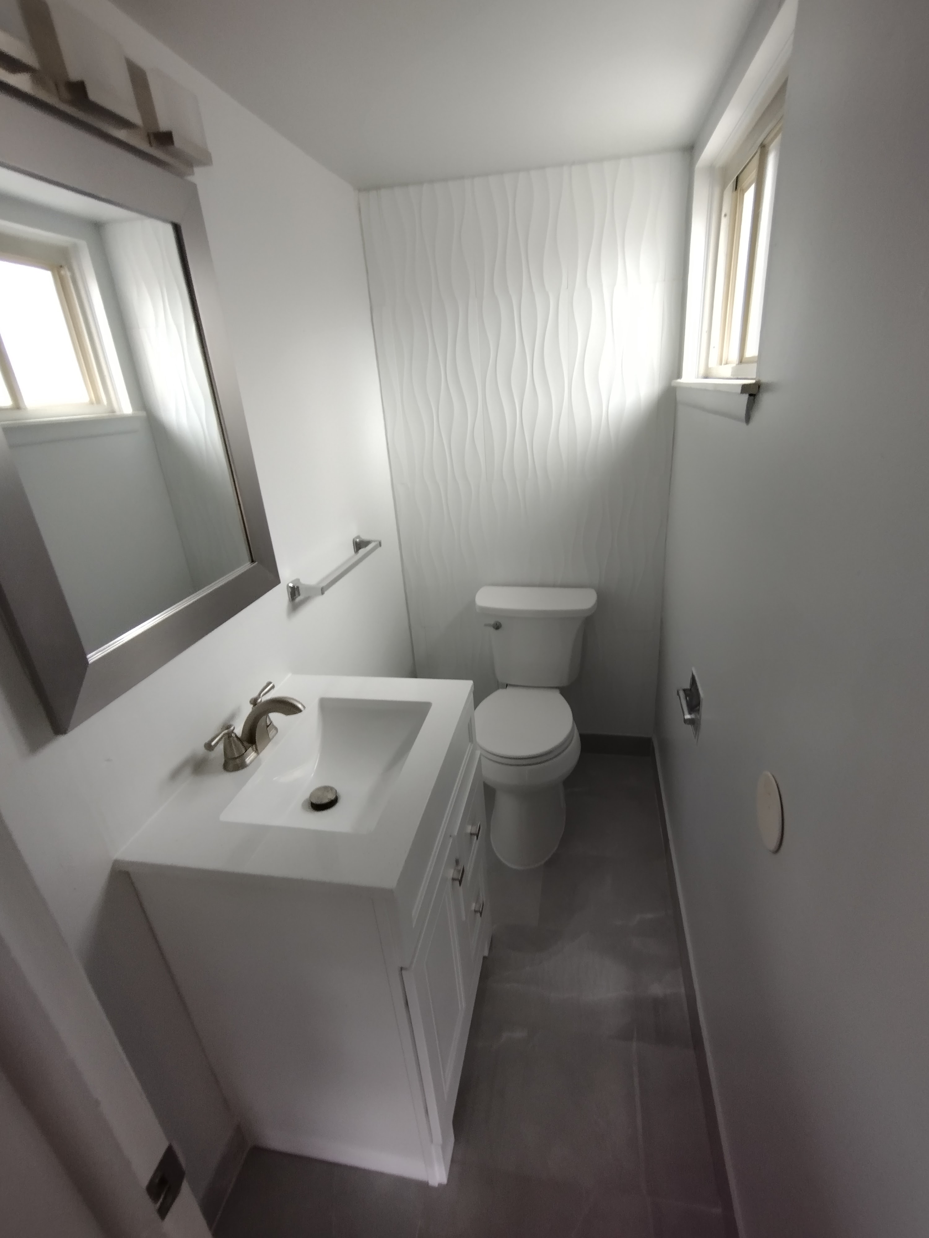 Final shot of completed half-bathroom renovation